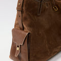 Medium Yore Hobo Bag in Sandal Suede leather with a front flap pocket and gold clasp.