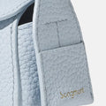 Sky blue Mini Drippy AirPods Case with textured leather and gold Songmont logo