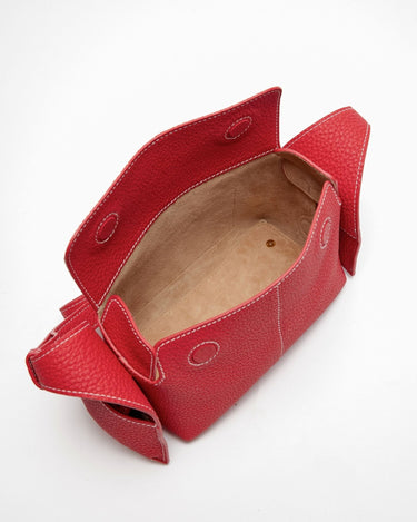 Red full-grain leather Mini Drippy Roof Bag with stainless steel hardware and white stitching