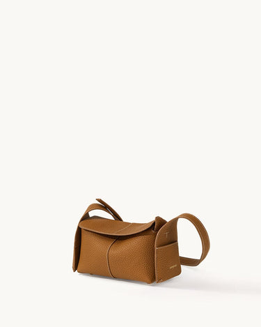 Mini Drippy Roof Bag in Mocha, a compact leather shoulder bag with a flap closure and textured finish.