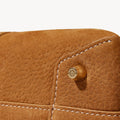 Songmont Mini Drippy Roof Bag in Sea Buckthorn nubuck leather with white stitching and gold logo stud.