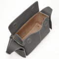 Mini Drippy Roof Bag in stardust pebbled leather with white stitching and sheepskin lining.