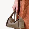 Taupe Mini Drippy Roof Bag: textured leather, white stitching, architectural design, Songmont logo.