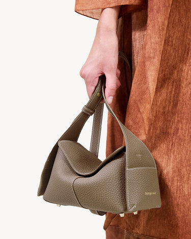 Taupe Mini Drippy Roof Bag: textured leather, white stitching, architectural design, Songmont logo.