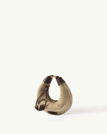 Mini Luna Airpods case in cow suede leather with full-grain leather details and gold hardware.