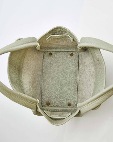 Interior of the Jade Mini Song Bag, showing pebbled leather and suede lining.