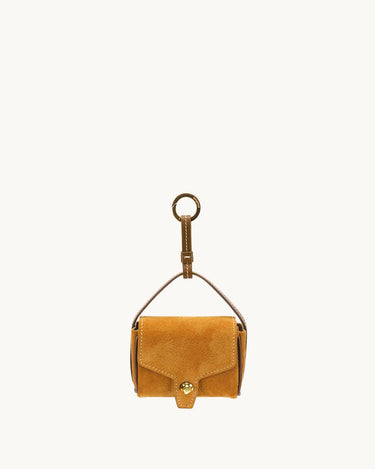 Ochre Mini Yore AirPods Case made of suede with a gold-tone clasp and keychain attachment.