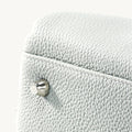 Mini Yore Bowling Bag in Celeste: Textured full-grain leather with silver hardware clasp.