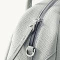 Mini Yore Bowling Bag in Celeste grey full-grain leather with silver zipper detail.