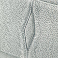 Close-up of Celeste Mini Yore Bowling Bag full-grain leather with visible stitching and textured detail.
