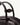 Mini Yore Bowling Bag in ebony full-grain nappa leather with white stitching and debossed Songmont logo.