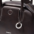 Mini Yore Bowling Bag in dark brown full-grain Nappa leather with white stitching and silver hardware.