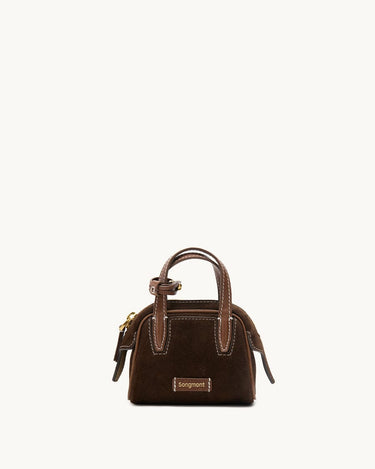 Mini Yore Bowling Case in Chestnut Suede with leather handles and white stitching. Features embossed Songmont logo.