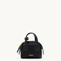 Mini Yore black full-grain leather bowling case with white stitching and gold hardware.