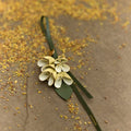Osmanthus Charm leather accessory designed as a flower, crafted with handmade techniques.
