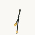 Onyx Prayer Wheel Charm with gold-tone hardware and Songmont logo on black leather strap.