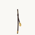 Sandal brown leather prayer wheel charm with gold hardware and "Songmont" logo.