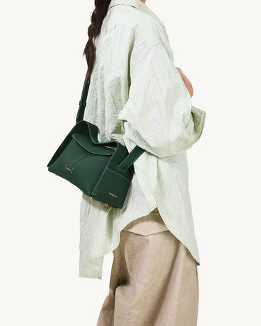 Green full-grain leather small drippy roof bag with microfiber lining and stainless steel hardware.