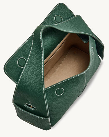 Small Drippy Roof Bag in dark green full-grain leather with white stitching and microfiber lining.