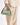 Small light green pebbled full-grain leather handbag with gold branding. Adjustable strap.
