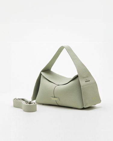 Small green pebble-grain leather handbag with top handle and detachable strap, featuring gold 'Songmont' logo.