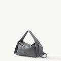 Small grey full-grain leather crossbody bag with microfiber lining and stainless steel hardware.