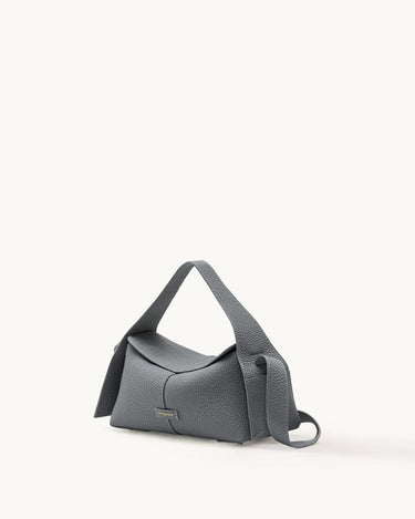 Small grey full-grain leather crossbody bag with microfiber lining and stainless steel hardware.