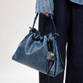 Navy Small Gather Bag Set in Nappa leather with braided straps and gold hardware.