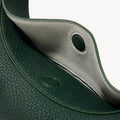 Emerald Small Luna Bag interior detail with textured leather and snap closure