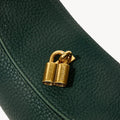 Small Luna Bag in emerald green textured leather with gold Songmont lock hardware.