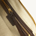 Medium Luna Hobo Bag interior with brown leather zipper pull and herringbone lining