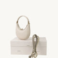 Ivory Luna bag and cream apricot leash on Songmont box