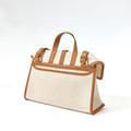 Small Shan Satchel Bag in Canvas with tan leather trim and handles. Stylish structured design.