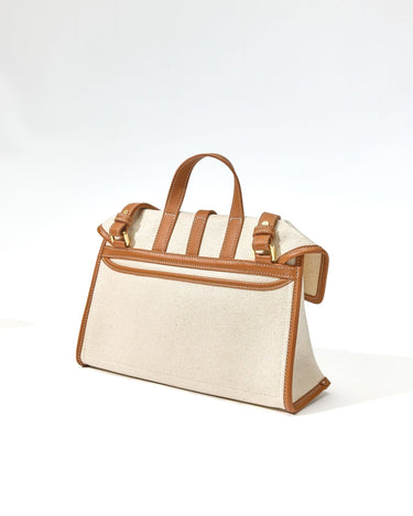 Small Shan Satchel Bag in Canvas with tan leather trim and handles. Stylish structured design.