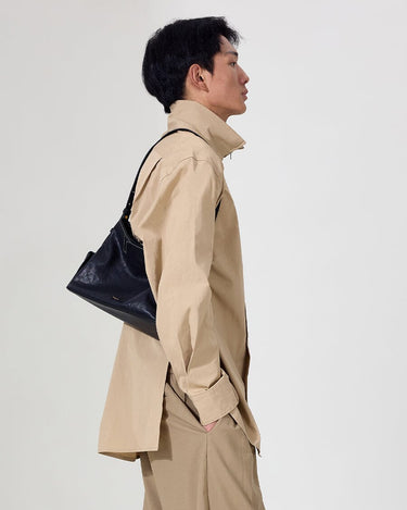 Small Yore Hobo Bag in Onyx, crafted from vegetable-tanned leather with adjustable strap for versatile wear.