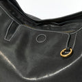 Small Yore Hobo Bag in black leather with white stitching and gold hardware