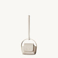 Songmont off-white full-grain leather AirPods case with magnetic closure and handle