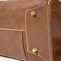 Large Shan Briefcase in Sandal brown leather, white stitching, brass hardware.