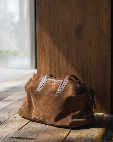 Medium Yore Duffle Bag, Sandal Suede: brown cow suede, leather trim, stainless steel hardware.