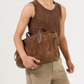 Medium Yore Duffle Bag, Sandal Suede cow suede with leather trim and stainless steel hardware.