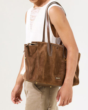 Medium Yore Duffle Bag in Sandal Suede. Cow suede leather with leather trim, white stitching, and stainless steel hardware.