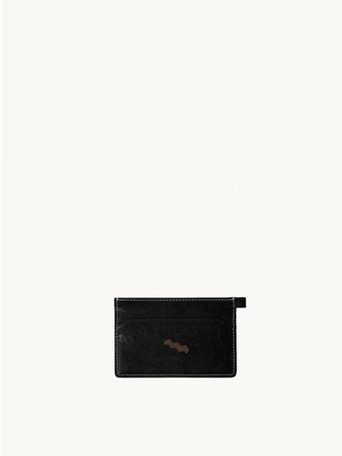 Yore Card Holder: Onyx black leather, white stitching, embossed logo. Holds cards.