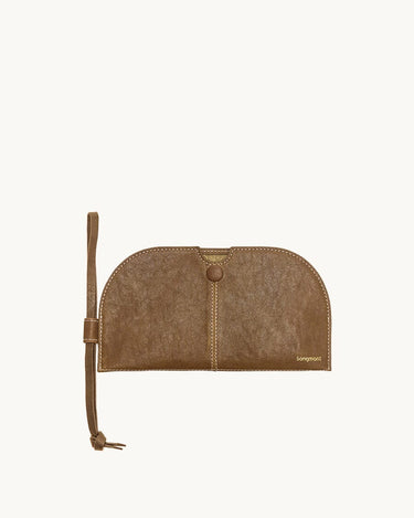 Yore Glasses Case in Sandal brown vegetable-tanned leather with snap closure and side lanyard.