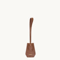 Sandal colored Yore Key Chain crafted from vegetable-tanned leather with white stitching and embossed Songmont logo.