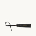 Yore Luggage Tag: black vegetable-tanned leather with white stitching and gold buckle. Features 'Songmont' embossed.