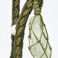 Tranquil Crystal Charm with olivine stone, braided leather, and macrame cord detail
