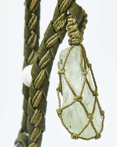Tranquil Crystal Charm with olivine stone, braided leather, and macrame cord detail
