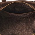 Brown Yore Baguette Bag interior with slip pocket and gold zipper, vegetable-tanned leather