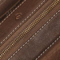 Yore Baguette Bag in Sandal color, featuring vegetable-tanned leather, white stitching, and a gold zipper.