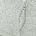Yore Toast Bag: Light gray full-grain leather with textured grain and stitched detailing.